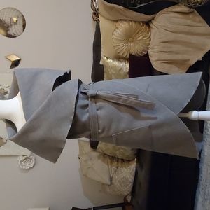 Beautiful sleeveless wrap with pockets one size fits most